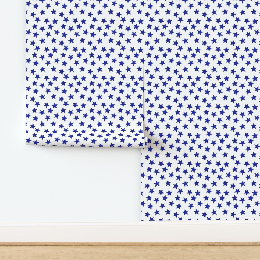Faded Royal Blue Christmas Stars on White Wallpaper design