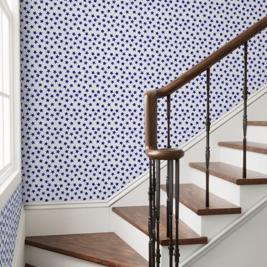 Faded Royal Blue Christmas Stars on White Wallpaper faded stars wallpaper
